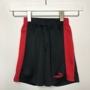 Puma black and red athletic shorts